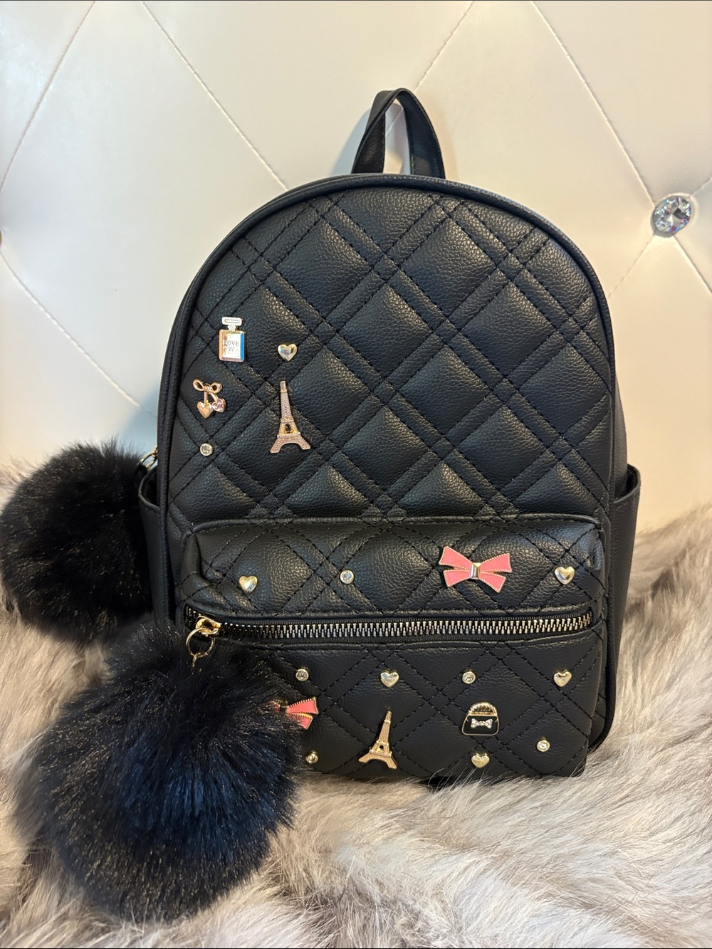 Under One Sky Black Quilted Mini Backpack with Pink Bow Accents